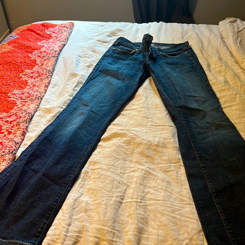 Citizens of Humanity boot cut jeans. A little frayed at the bottom.